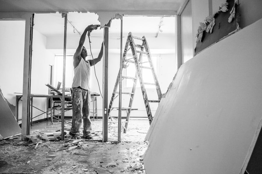 Working from a ladder on a wall repair