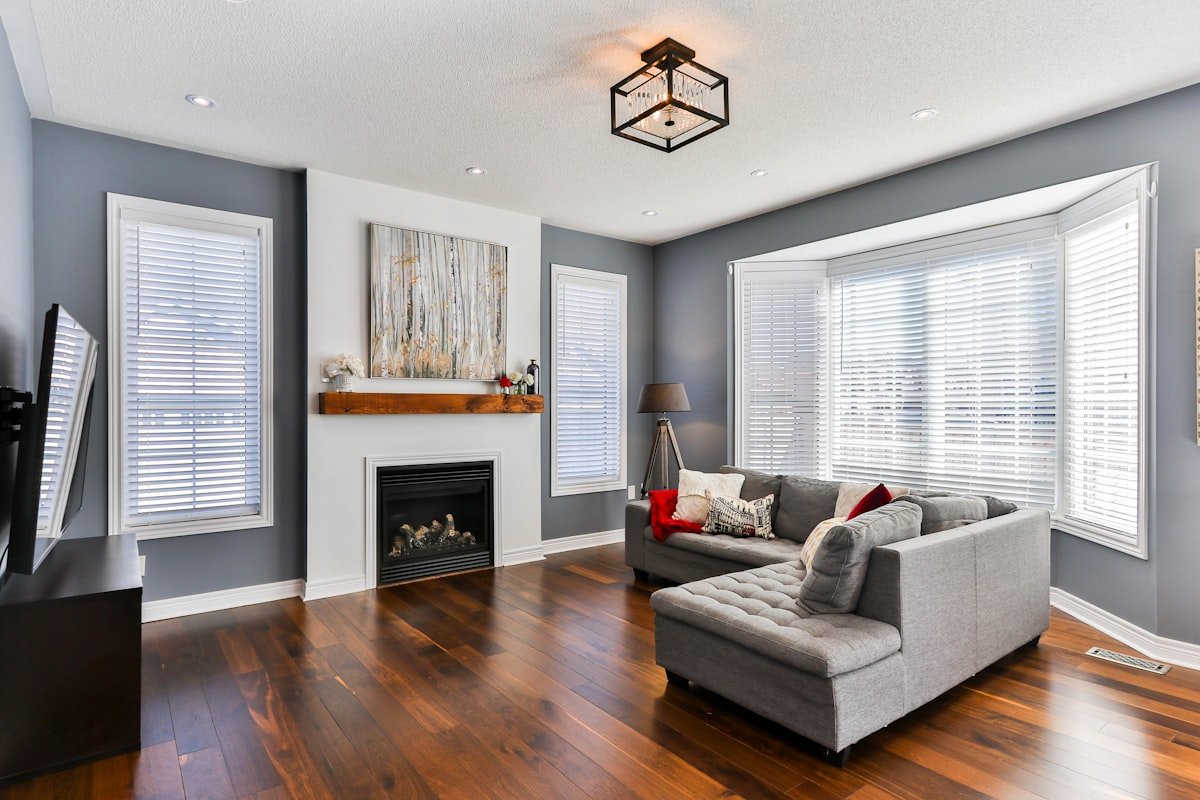 Finished living room with parquet flooring and fresh paint